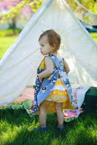 baby girl wearing a bummies ruffle bloomer outfit