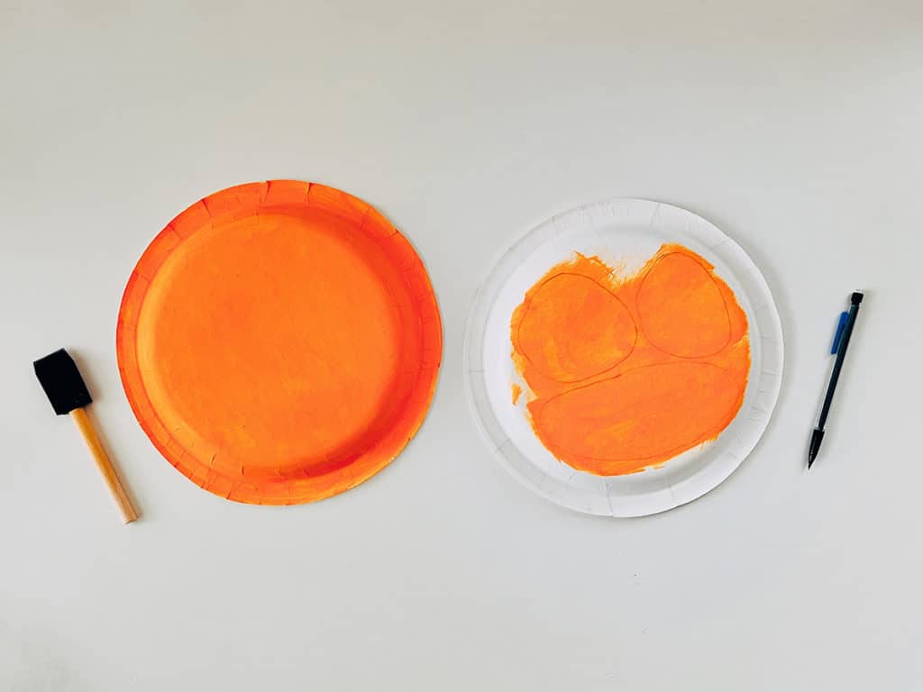 paper plates painted orange
